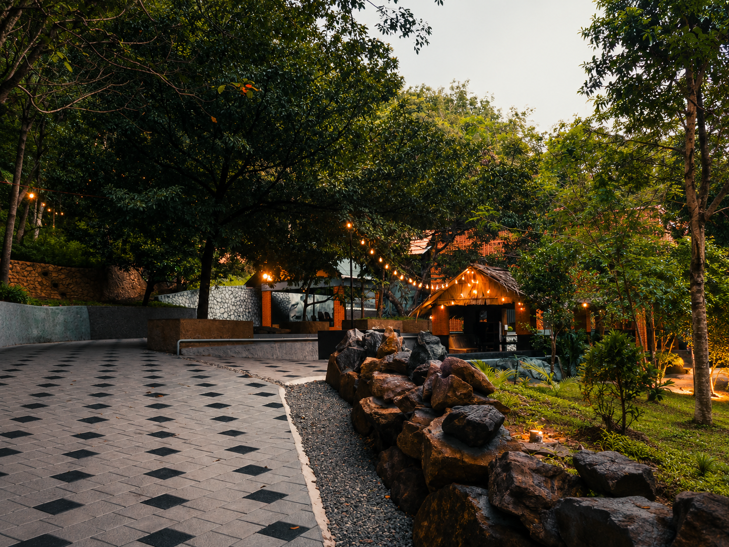 Pandora Resort Kudayathoor surrounded by lush greenery and landscaped outdoor spaces in Idukki, Kerala