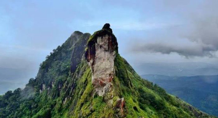 Illikkal Kallu rock formation and mountain landscape near Pandora Resort Kudayathoor, Kerala